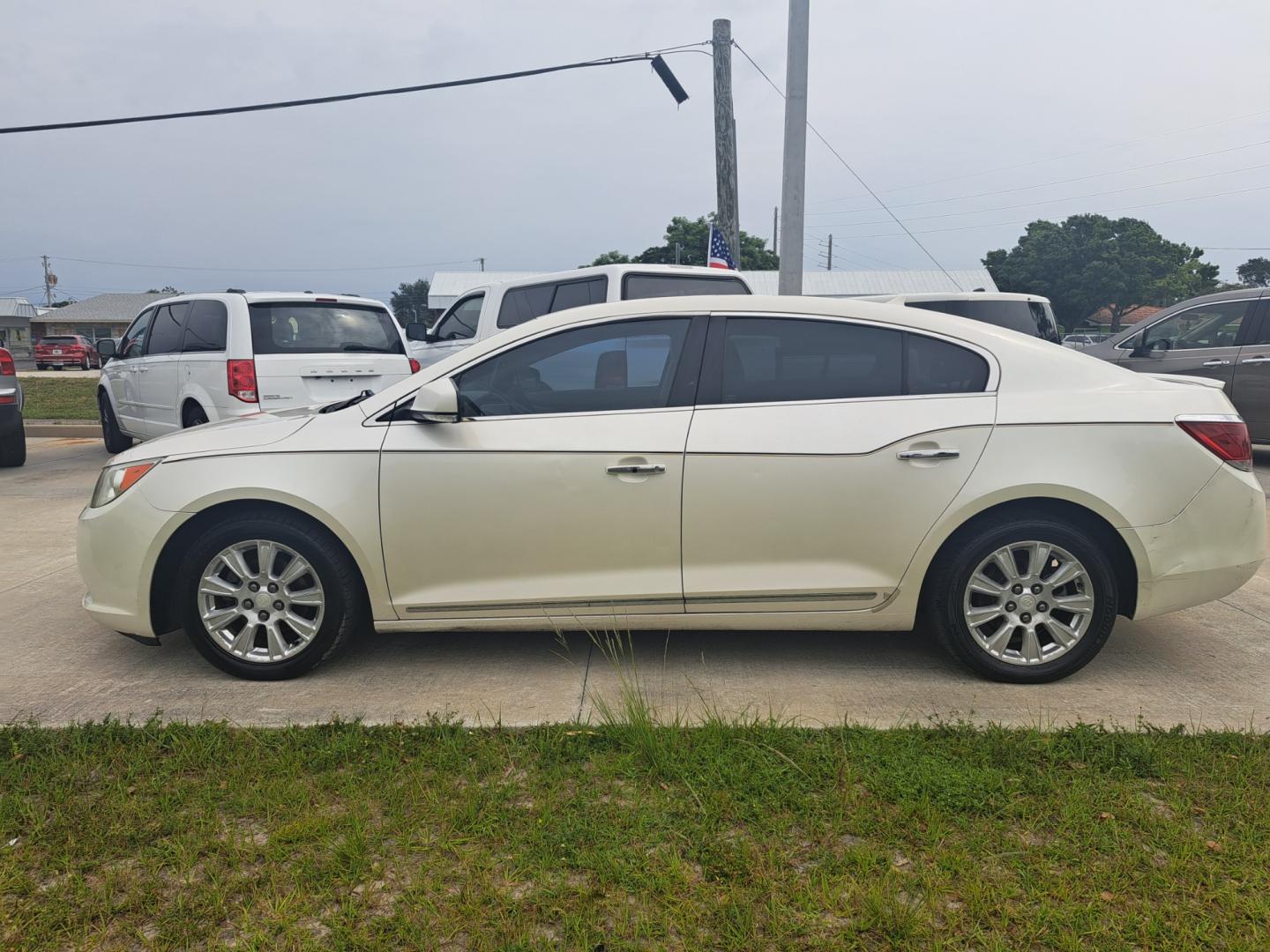 2012 White Buick LaCrosse (1G4GD5ER8CF) , located at 1181 Aurora Rd, Melbourne, FL, 32935, (321) 241-1100, 28.132914, -80.639175 - Photo#0